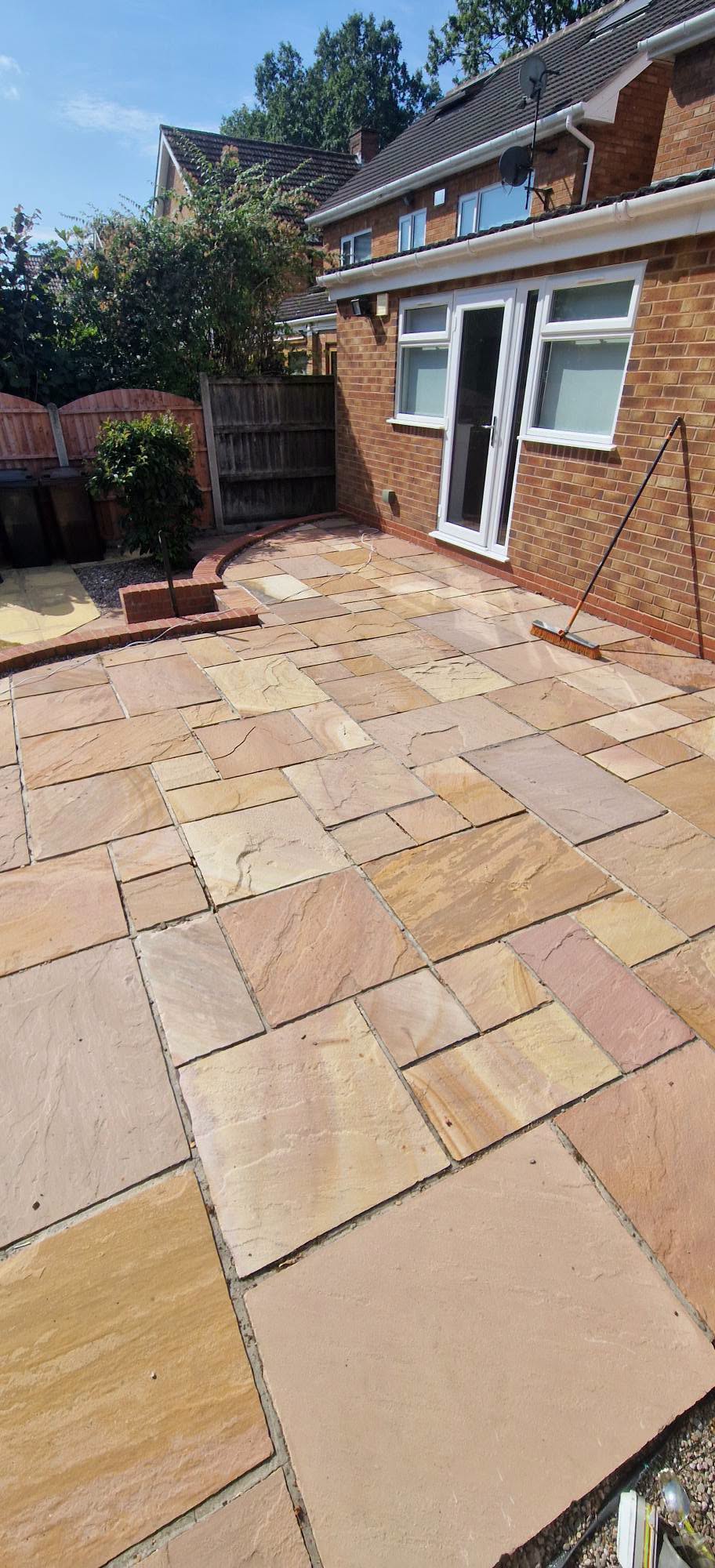 Restored sandstone patio in full sun after patio cleaning in Worcestershire